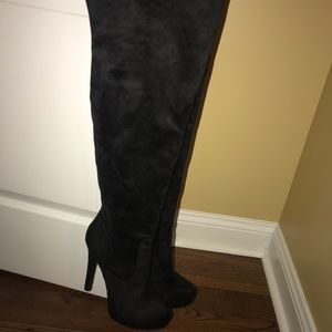 Black thigh high boots